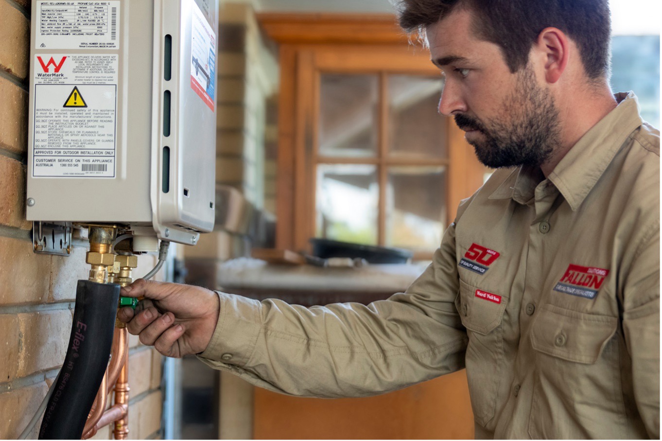 Fallon man servicing a hot water system