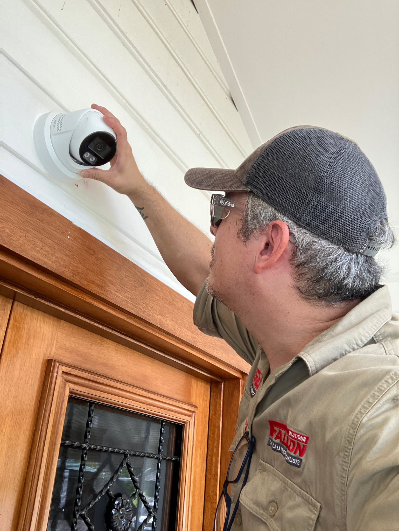 side view CCTV installation above door