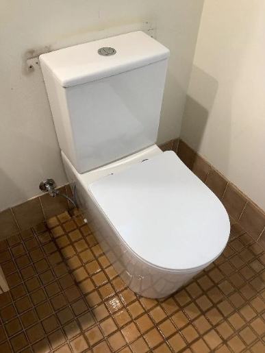 Modern new toilet installed at a property in cleveland