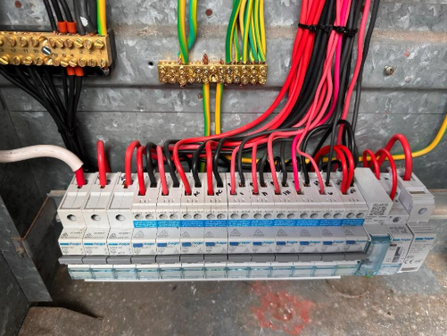 Modern safety switches installed on a switchboard at a property in Thornlands