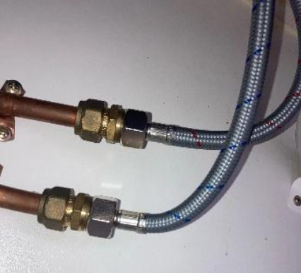 new flexi hose connections under basin mixer tap at a property in Thornlands