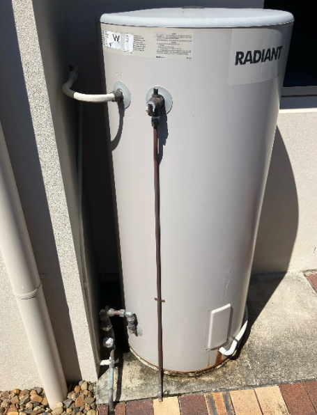 old leaking radiant hot water system to be replaced at a property in Coolum