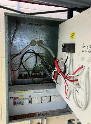 An old, non compliant switchboard at a household in Palm Beach.