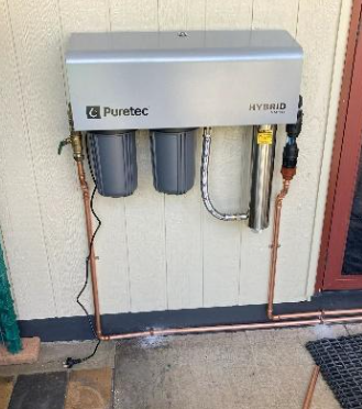 A brand new installed Puretec entire home water filtration system in Caloundra.