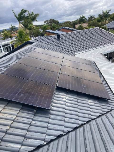 Image of solar panels on a rooftop in Robina, during a solar upgrade project.