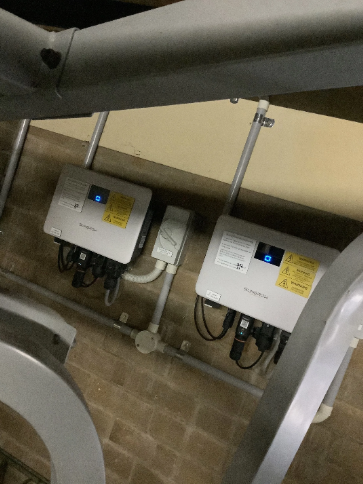 two new solar inverters installed at a property in Redcliffe