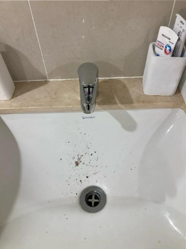 worn basin tap to be replaced at a property in Redcliffe