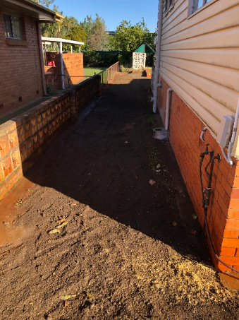 above ground photo after sewer line excavation and replacement at a property in Sunnybank