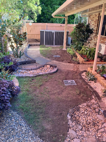 backyard after excavation and installation of new stormwater pits and piping at a property in wynnum