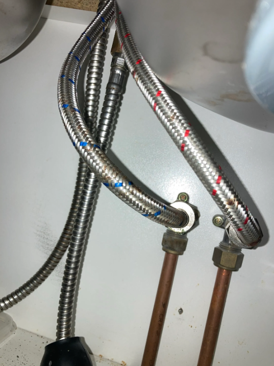 new flexi hose connections installed for a dishwasher at a property in Redcliffe