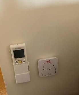 new hardwired smoke alarm silence button installed at a property in Fortitude Valley