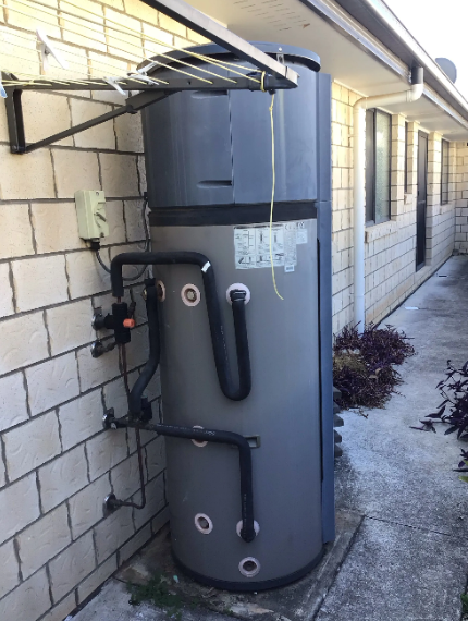 old faulty hot water tank to be replaced at a property in Kallangur