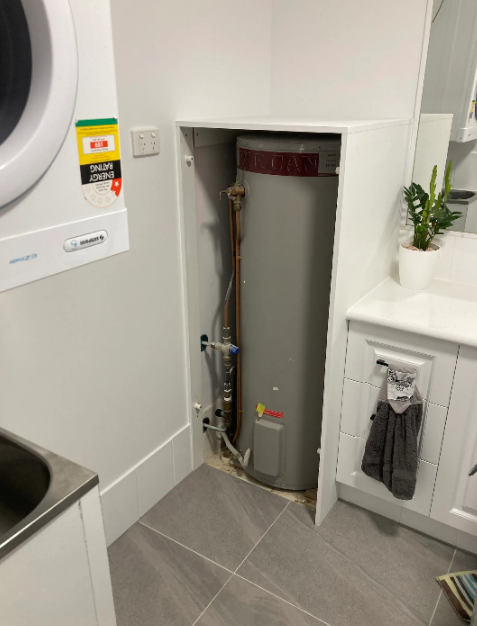 old hot water system to be replaced at a property in Palm Beach