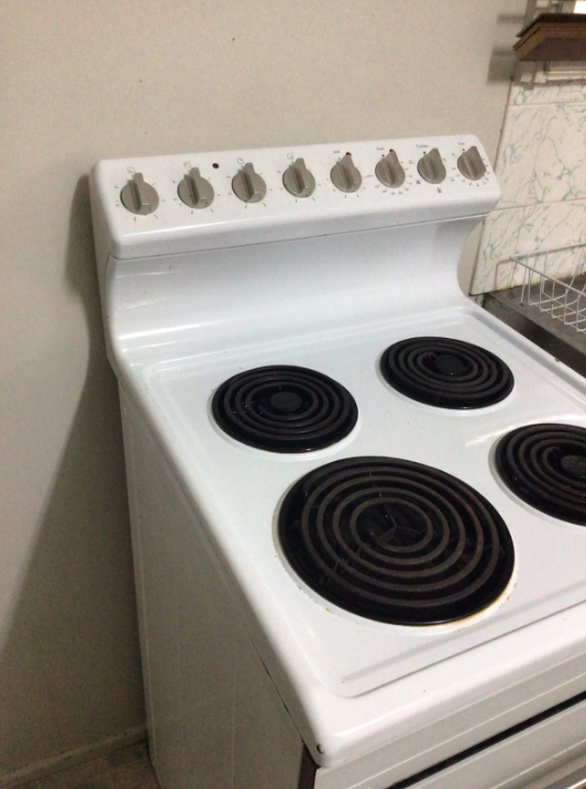 old oven with broken fan to be repaired at a property in Mount Gravatt