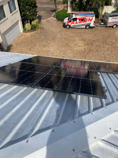 old solar system to be replaced at a property in Runaway Bay